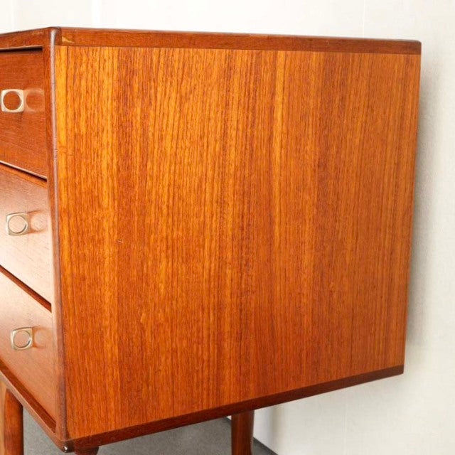 Vintage teak sideboard by Younger featuring British mid-century design, smooth wood grain, and tapered legs.