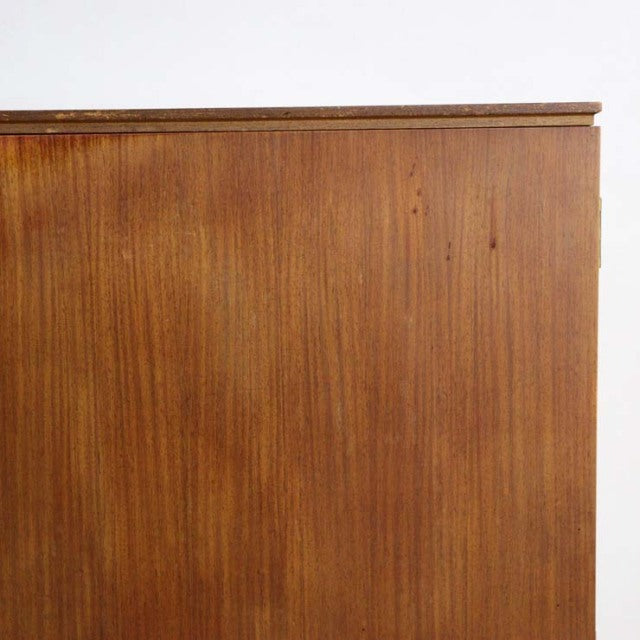 Mid-century British vintage teak sideboard showing rich wood grain and clean rectangular top edge with smooth finish.