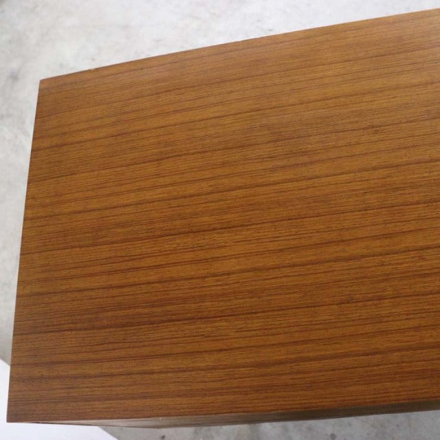 Vintage teak British mid-century sideboard top with fine straight wood grain and smooth finish.