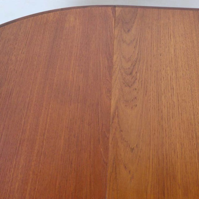 Vintage teak G-Plan dining table top with visible wood grain and mid-century British design.