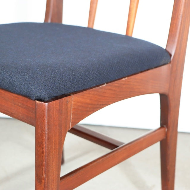 Vintage teak dining chair by YOUNGER, British mid-century design from Denmark, featuring dark fabric seat and tapered legs.