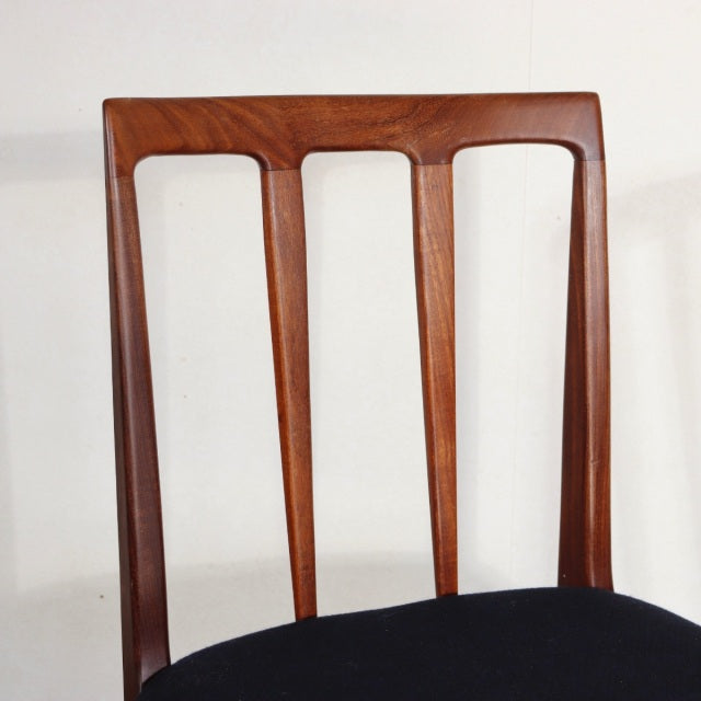 Mid-century vintage teak dining chair by YOUNGER with British-Denmark design, smooth wood grain, black upholstered seat, and .