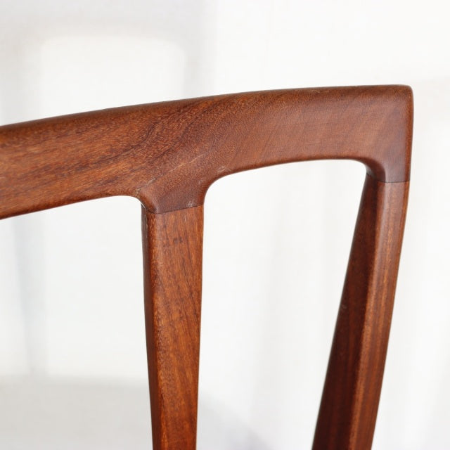 Vintage YOUNGER teak dining chair backrest showing rich wood grain and mid-century British design from Denmark.