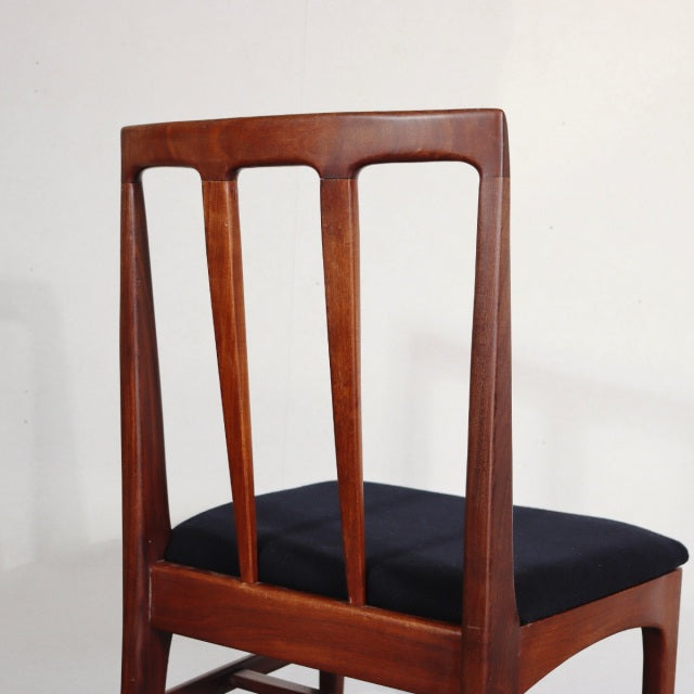 Vintage teak dining chair by YOUNGER with British mid-century design, slender vertical back slats, and black upholstered.