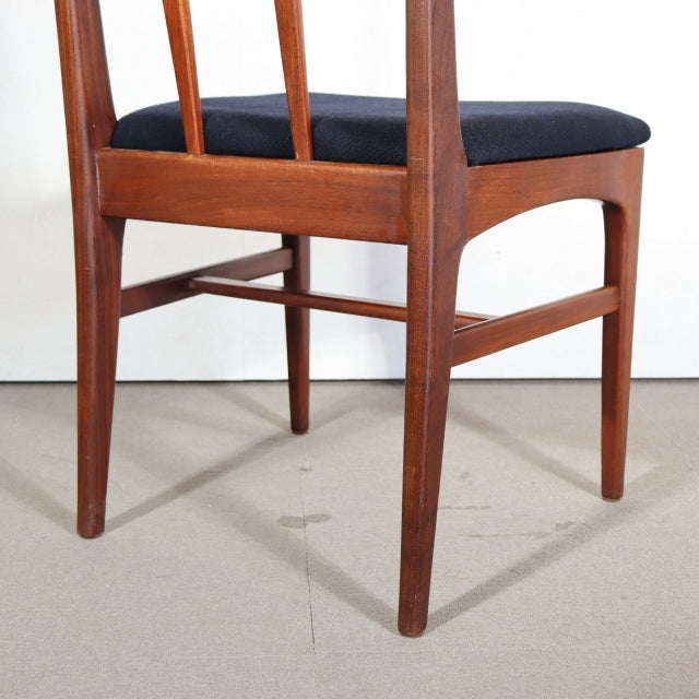 Vintage YOUNGER teak dining chair legs and frame with mid-century British-Denmark design and black upholstered seat.