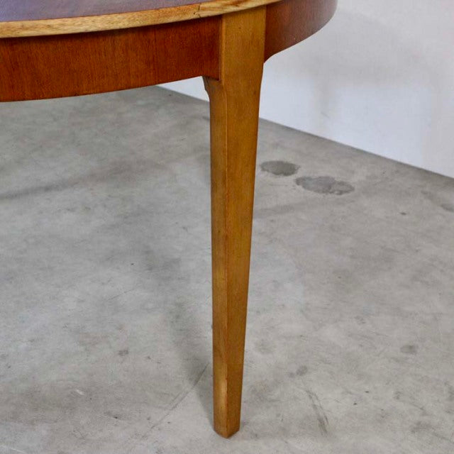 Mid-century teak round dining table leg with tapered British vintage wood grain finish.