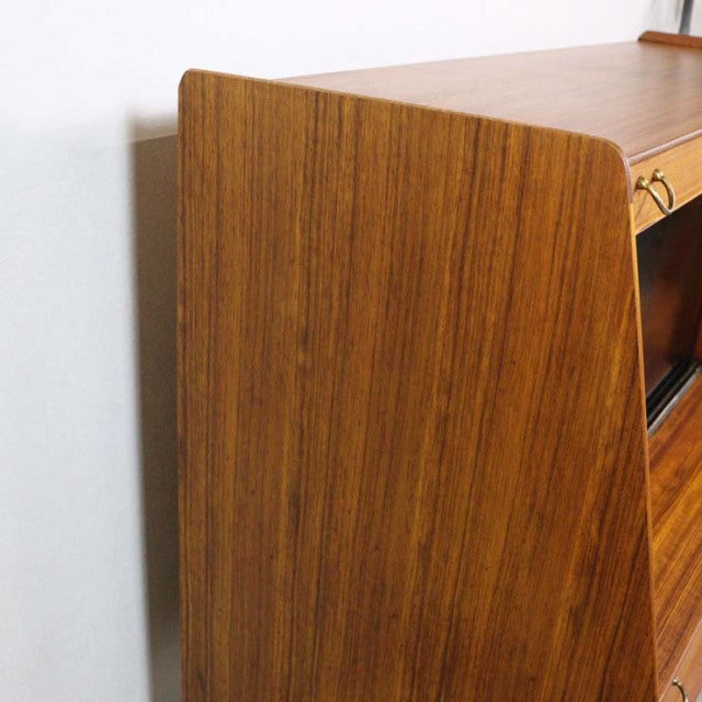Vintage British mid-century G-Plan teak highboard with rich wood grain and rounded edges.