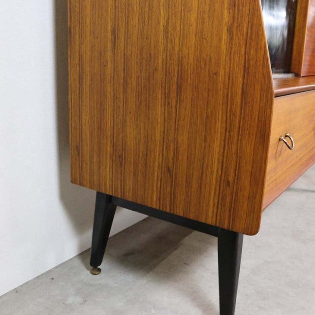 Vintage teak mid-century British G-Plan sideboard leg with black tapered wood and brass foot caps.