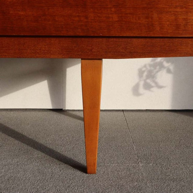 Mid-century British teak sideboard leg with warm wood grain and tapered design from Beautility vintage furniture.