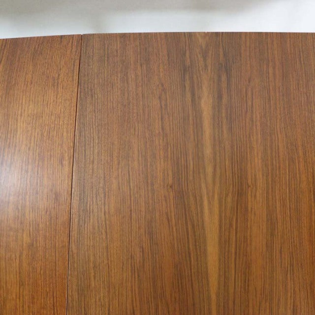 Mid-century British vintage teak dining table top with rich wood grain and smooth finish.