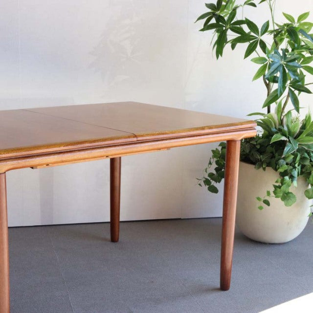 Vintage teak dining table by WhiteANDnewton with mid-century British-Denmark design, rectangular top, tapered legs, smooth.