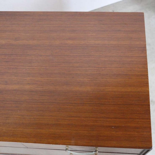 Vintage teak mid-century British chest top with rich wood grain and smooth finish.