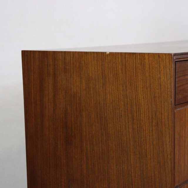 Vintage mid-century teak chest by Meredew, British brand with smooth wood grain and clean-lined edges.
