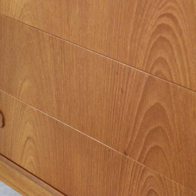 Vintage teak G-PLAN three-drawer chest showcasing mid-century British design with smooth wood grain and clean lines.