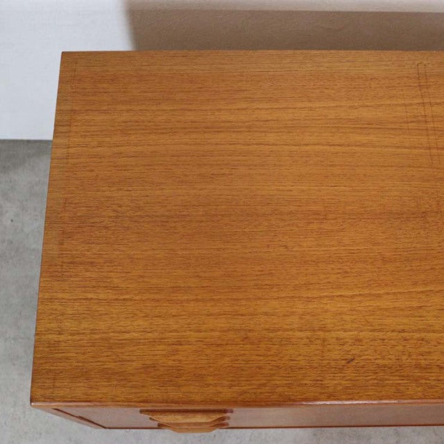 Mid-century vintage British G-Plan Fresco teak 3-drawer chest with visible wood grain and clean lines.