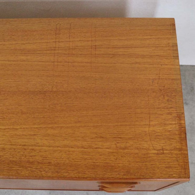 Top view of vintage British G-Plan Fresco teak chest with rich wood grain and subtle wear on mid-century surface.