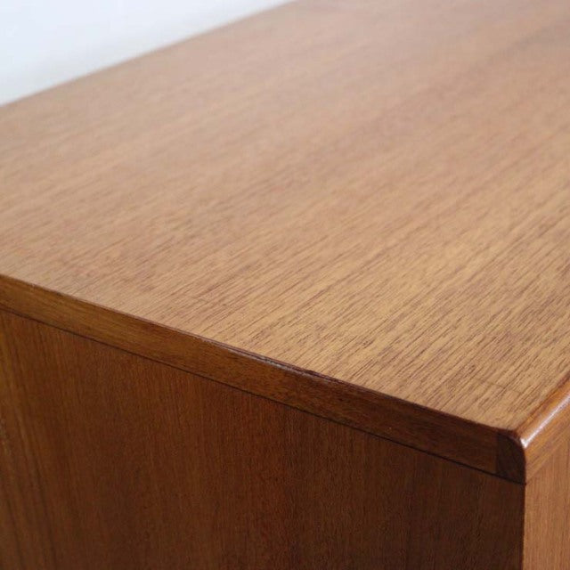 Vintage British G-Plan Fresco teak three-drawer chest with clean mid-century lines and rich wood grain.