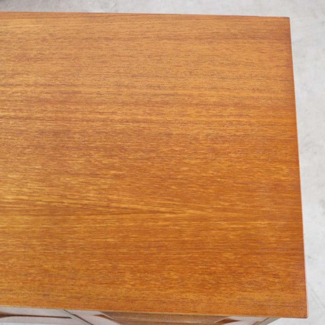 Mid-century British vintage teak sideboard top with warm honey wood grain and smooth finish.