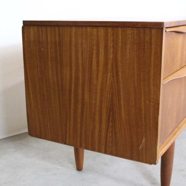 Vintage mid-century Austinsuite teak sideboard from British-Denmark design with clean wood grain and tapered legs.