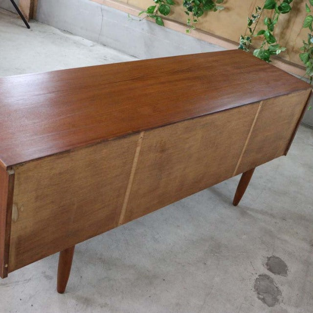 Mid-century vintage teak sideboard by Austinsuite, British-Denmark design, rich wood grain, tapered legs.
