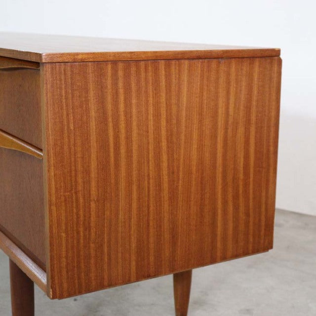 Vintage mid-century British teak sideboard by Austinsuite with rich wood grain and tapered legs from Denmark.