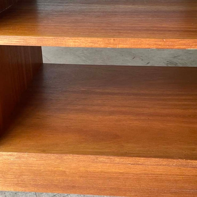Mid-century vintage teak TV board shelf with smooth wood grain and clean lines, British-Denmark design.