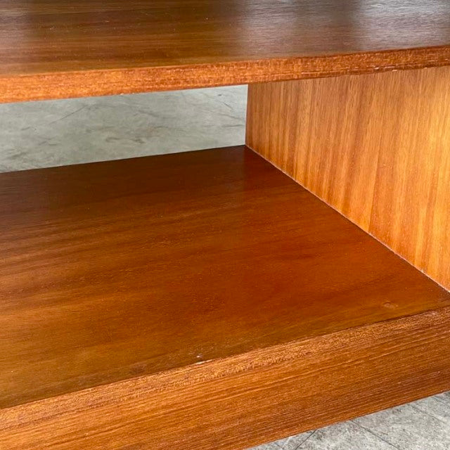 Vintage teak mid-century British TV board with rich wood grain and sturdy iron legs in Danish style.