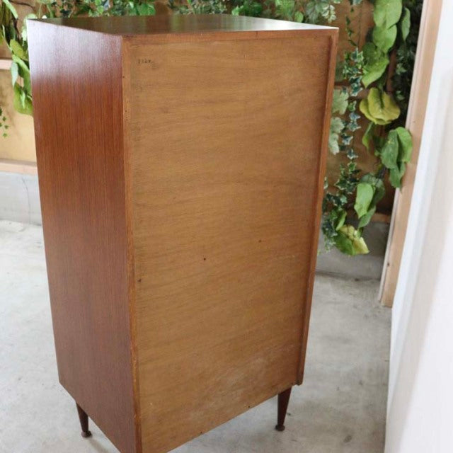 Mid-century British vintage teak six-drawer chest by MEREDEW, vintage wood grain, slender legs.