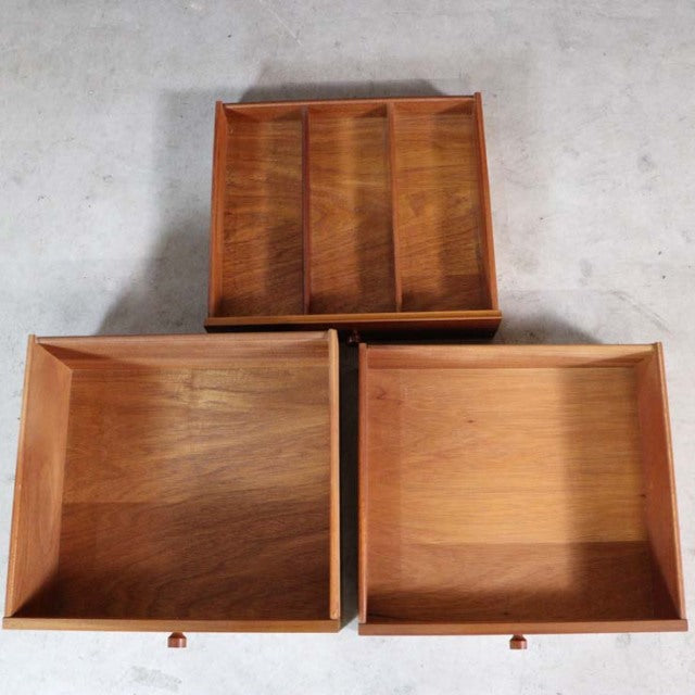 Vintage mid-century British teak sideboard drawers with rich wood grain and rounded knobs, designed by Nathan from Denmark.