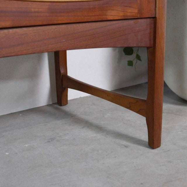 Mid-century vintage teak sideboard leg with sleek British design, smooth wood grain, and sturdy crossbar detail from Nathan.