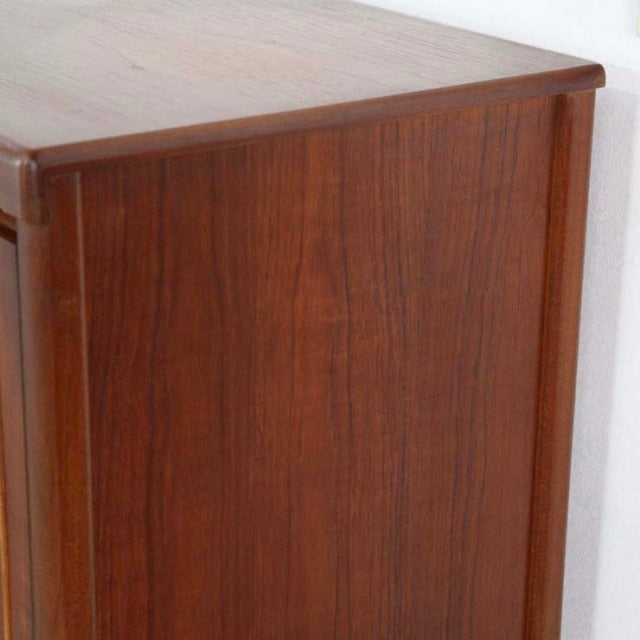 Vintage British mid-century teak sideboard by Nathan with rich wood grain and smooth square edges.
