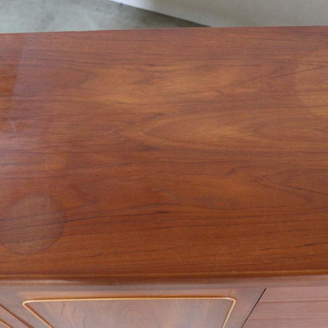 Vintage teak British mid-century sideboard top showing rich wood grain and smooth finish.