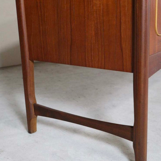 Mid-century British vintage teak sideboard leg with visible rich wood grain and sleek, tapered design from Nathan, Denmark.