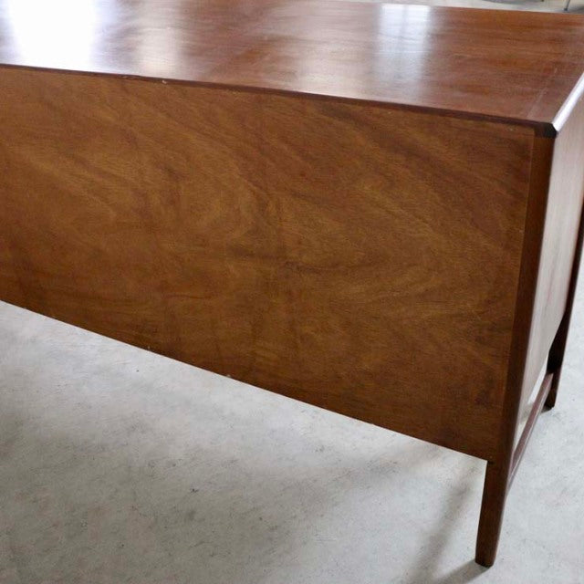 Mid-century British vintage teak sideboard by Nathan with rich wood grain and tapered legs from Denmark.