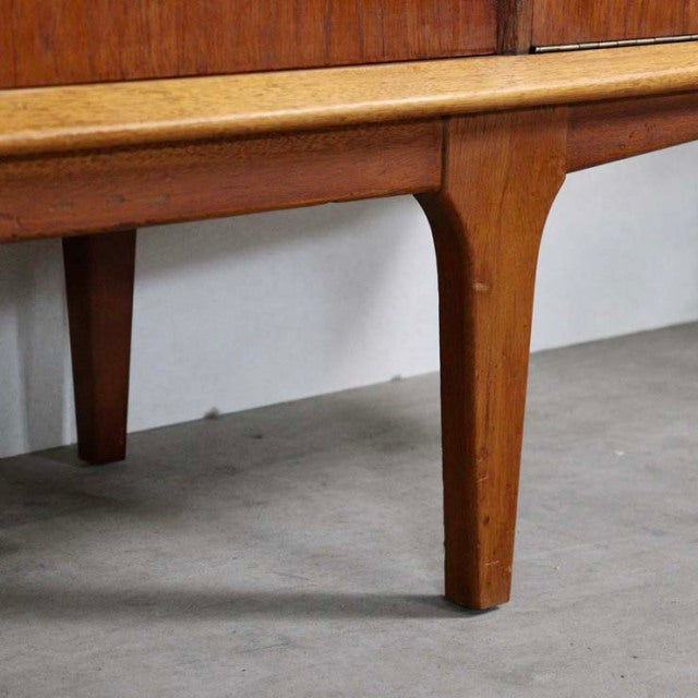 Mid-century vintage teak sideboard leg showcasing rich wood grain and elegant British-Denmark design.