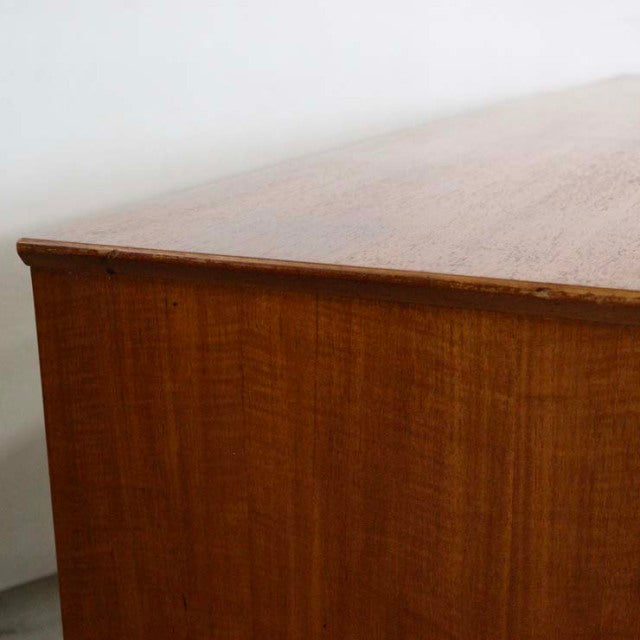 Mid-century vintage teak sideboard with smooth wood grain and clean-lined British design.