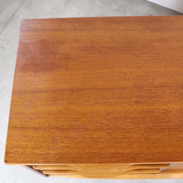 Mid-century British vintage teak sideboard top with rich wood grain and smooth finish.