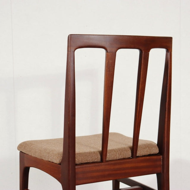 Vintage teak dining chair by Younger, British mid-century design with slender vertical back slats and beige upholstered seat.