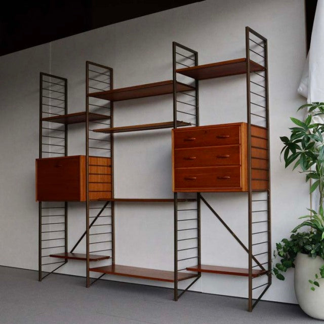 Vintage teak Ladderax unit shelf by Staples, British mid-century design with clean lines, metal frame, and multiple drawers.