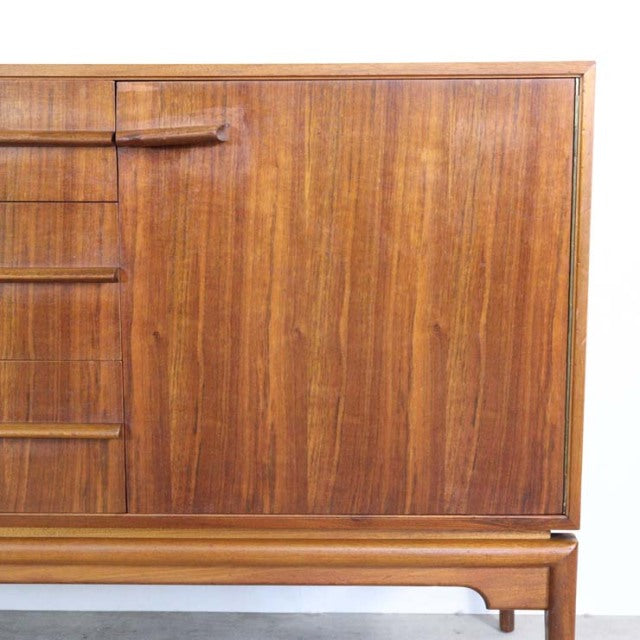 Mid-century British vintage teak sideboard by A.H. McIntosh with rich wood grain and clean lines.