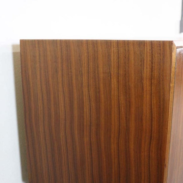 Vintage British mid-century teak sideboard by A.H. McIntosh with rich wood grain and clean lines.