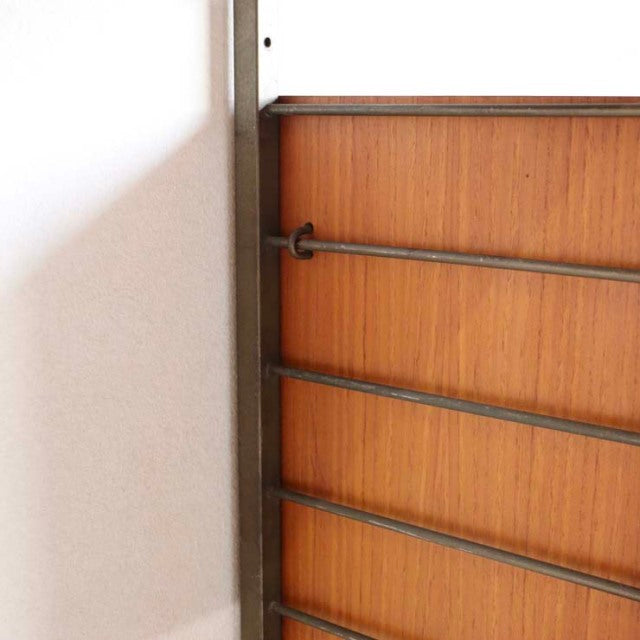 Vintage teak Ladderax shelving unit by Staples, British mid-century design with clean wood grain and metal supports, Denmark .
