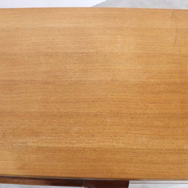 Vintage A.H.McIntosh teak sideboard with smooth wood grain surface, British mid-century design, clean rectangular top.