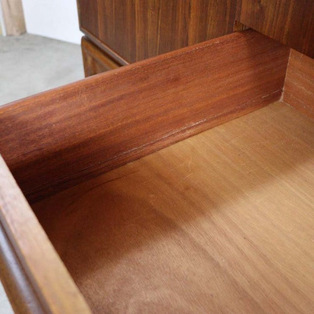 Close-up of vintage British mid-century teak sideboard drawer showcasing rich wood grain and smooth interior finish from A.H.