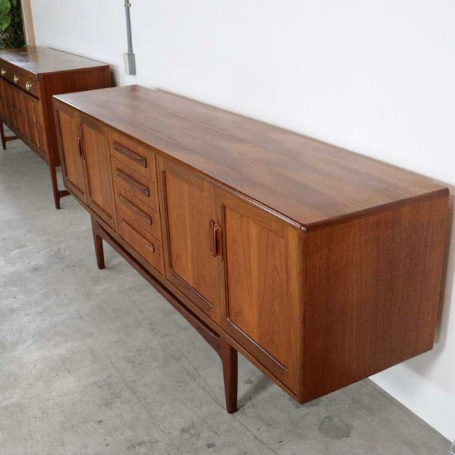 Long vintage G-Plan Fresco teak sideboard with mid-century British design, tapered legs, and rich wood grain.