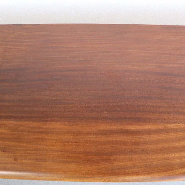 Mid-century vintage British teak sideboard top with rich wood grain and smooth finish.