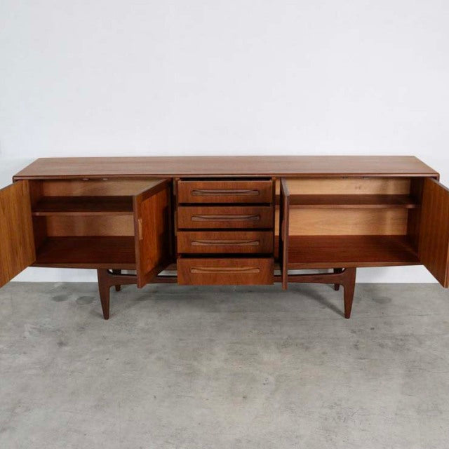 Vintage G-Plan Fresco sideboard in teak with rich wood grain, mid-century British design, featuring tapered legs, four.
