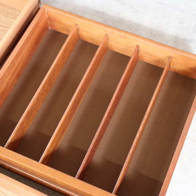 Vintage teak G-Plan Fresco sideboard drawer interior with wooden dividers and visible wood grain.