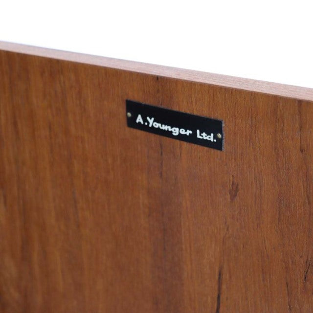 Close-up of vintage teak wood grain on mid-century British sideboard by A. Younger Ltd.