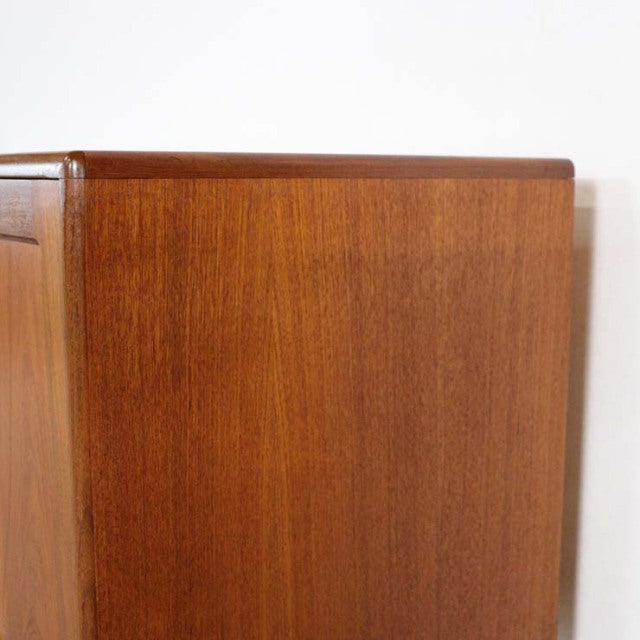 Mid-century British G-Plan Fresco teak sideboard with rich wood grain and sleek edges.